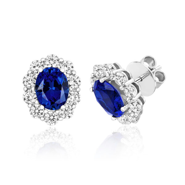 STERLING SILVER BLUE OVAL CLAW SET CLUSTER STUD EARRINGS (LAPIDARY)