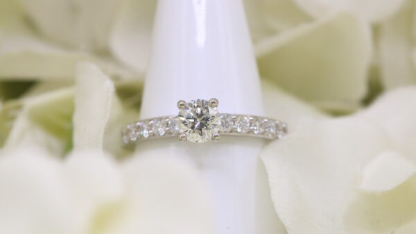 Platinum 0.61ct Brilliant Cut E/VS2 with 0.46ct Diamond Shoulders