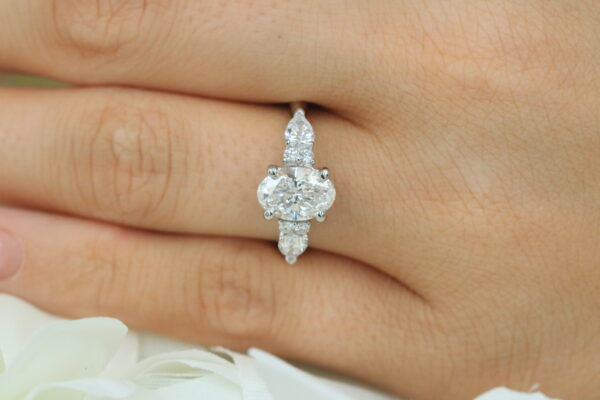 Platinum 1.51ct Oval D/VVS2 0.54ct Pear/Brilliant Sides - Image 2